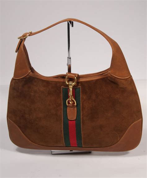 gucci brown hand bag|Gucci brown suede hobo bag.